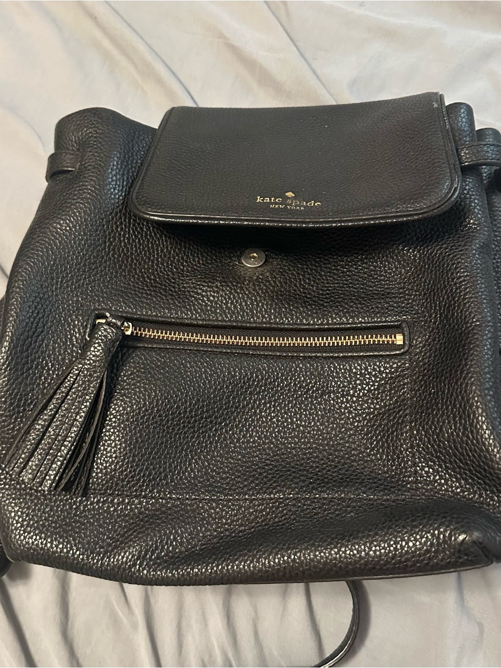 Kate Spade Black Pebbled backpack Tassel
